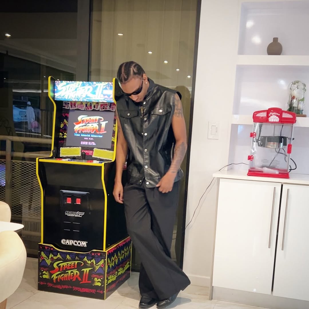 Bell Spumante beside an arcade cabinet